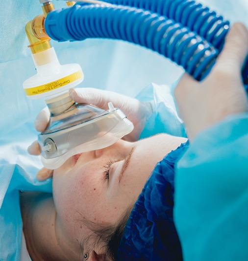 Patient receiving nitrous oxide dental sedation treatment