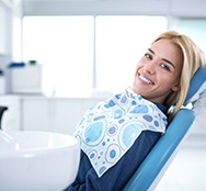 Smiling woman sitting in dental office